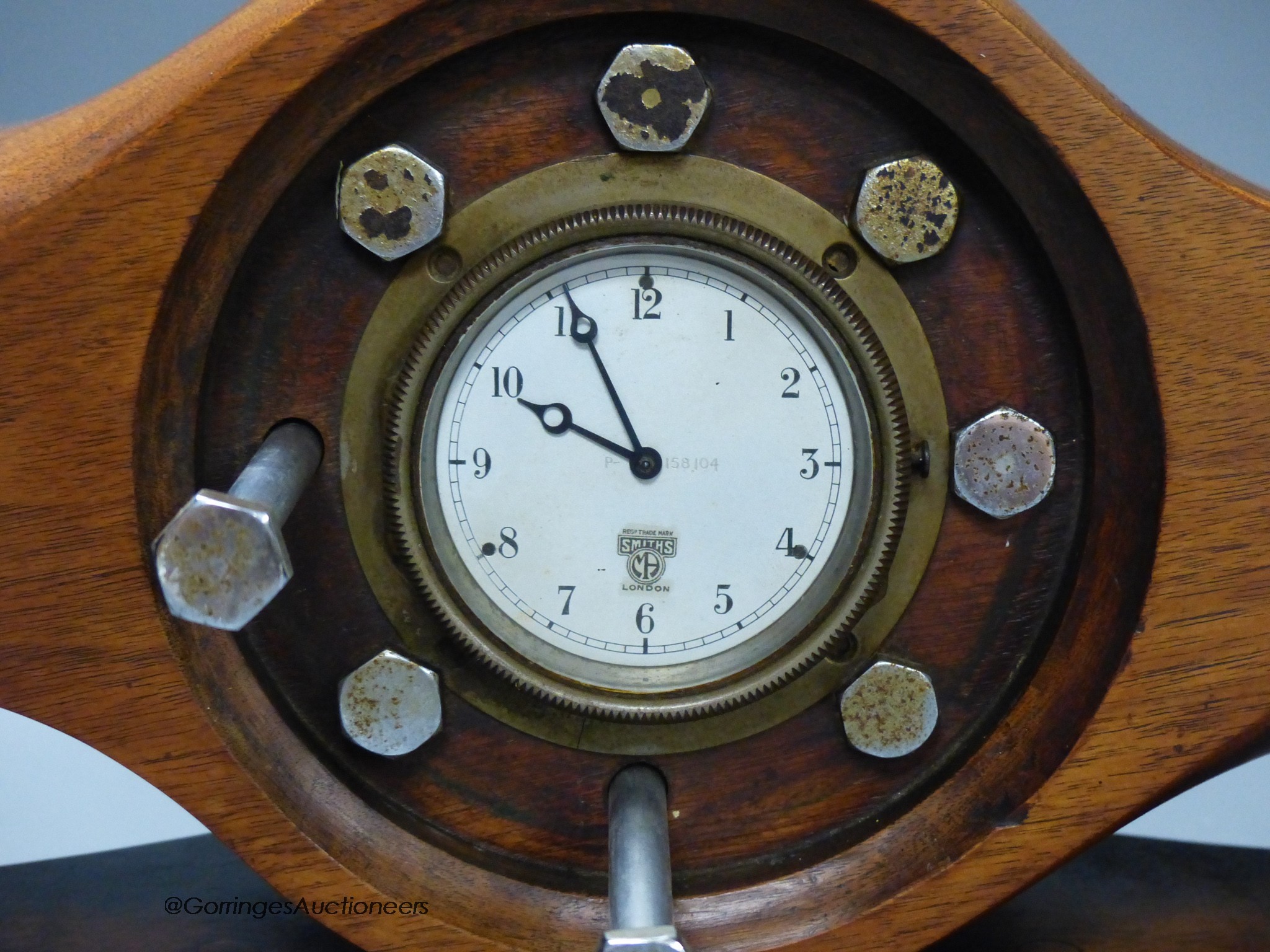 A Smith's aeroplane propeller hub mantel timepiece, 38cm long